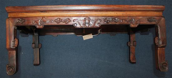 A Chinese huanghuali kang table, 18th/19th century, l. 29.5in., w. 17.25in., h. 12in., repairs